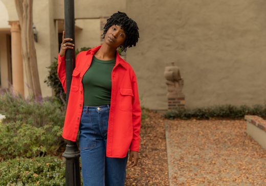 Cheyann is wearing Flannel Overshirt in Mustang Red, Baby Tee in Swamp Green and Carpenter Jeans in Dark Wash