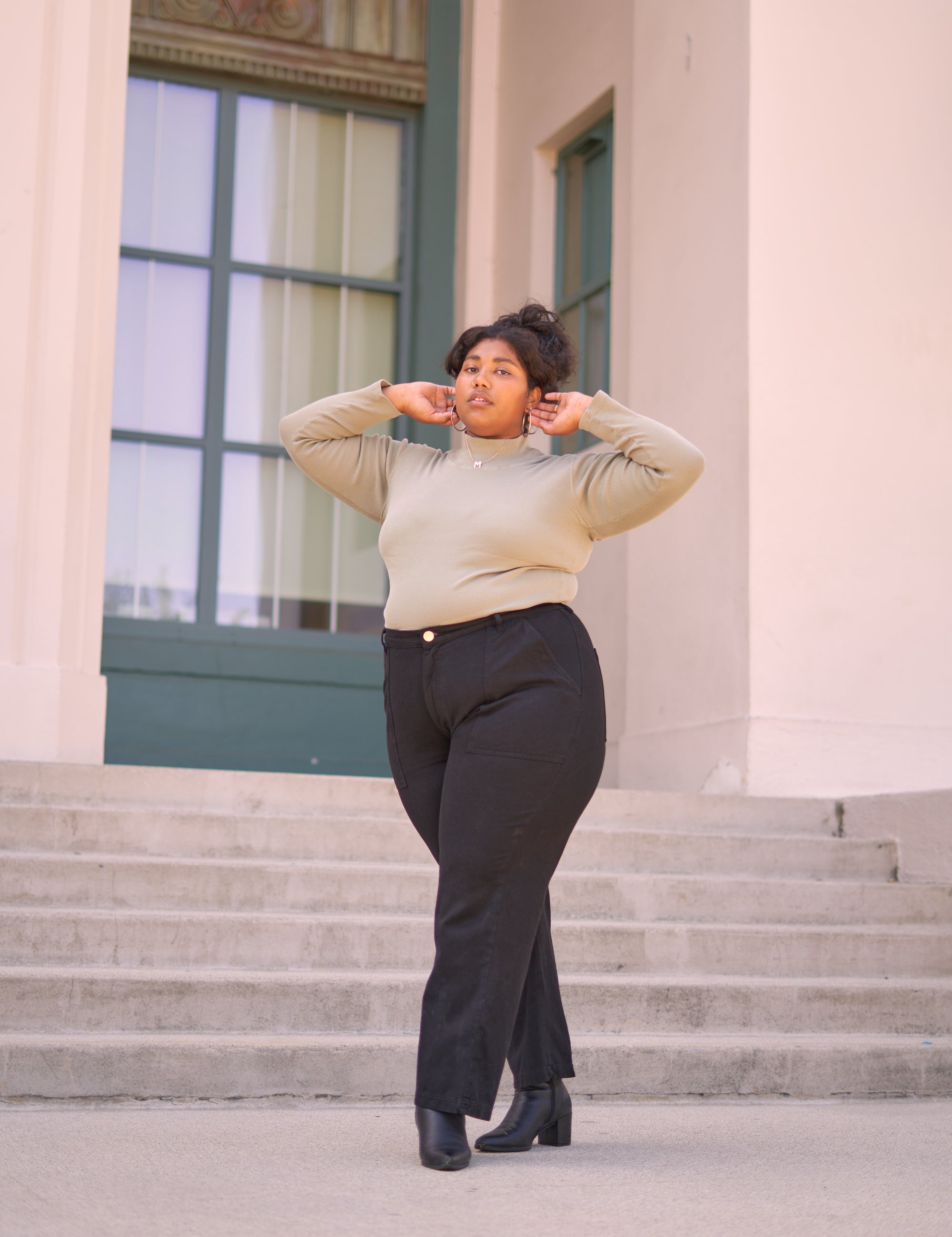 Organic Work Pants in black and Essential Turtleneck in khaki grey on Morgan