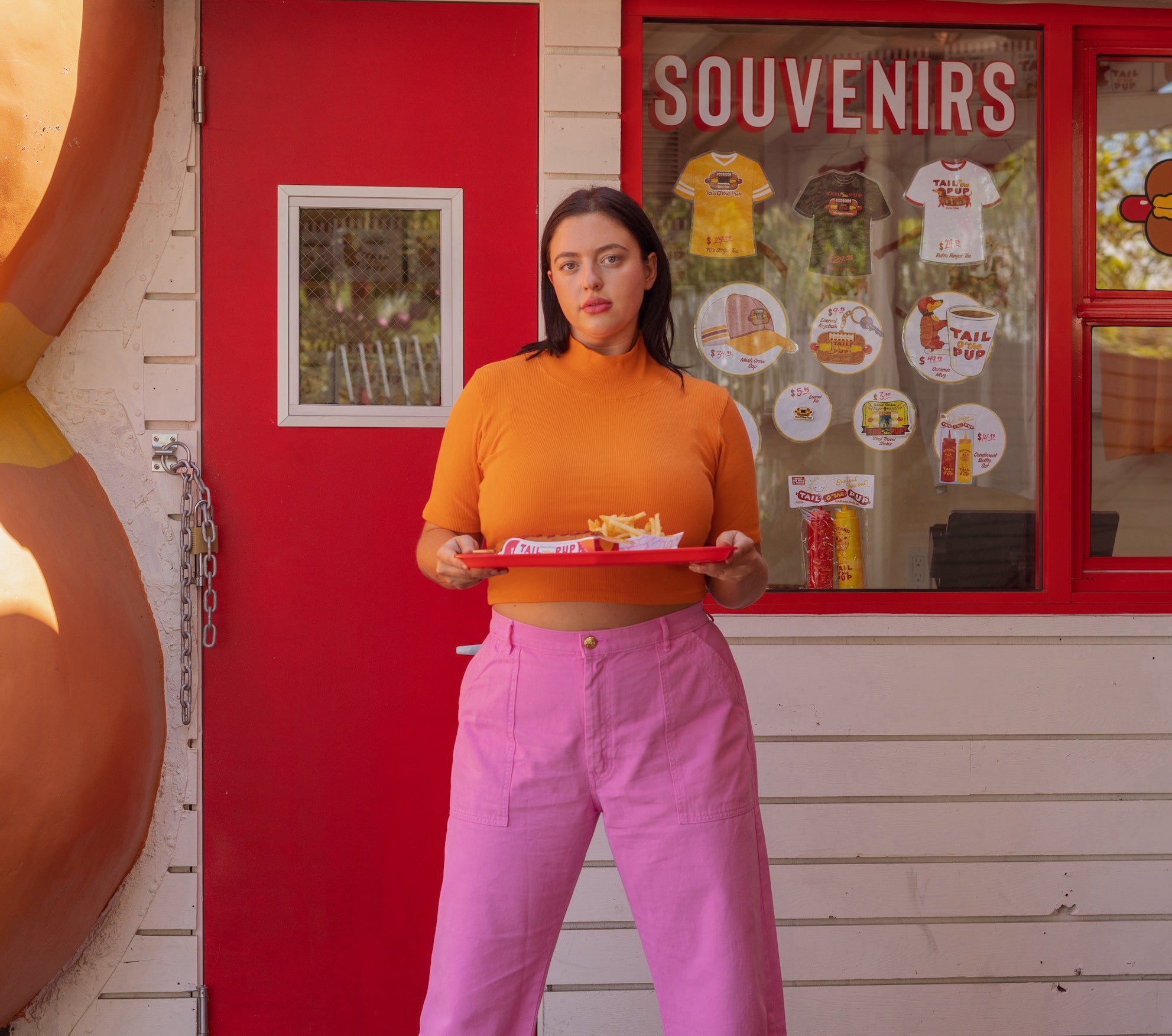 Faye wearing 1/2 Sleeve Essential Turtleneck in Creamsicle Orange and Work Pants in Bubblegum Pink