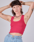 Alex is 5'8" and wearing P Cropped Tank Top in Hot Pink