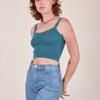 Alex is 5'8" and wearing P Cropped Cami in Marine Blue and light wash Frontier Jeans