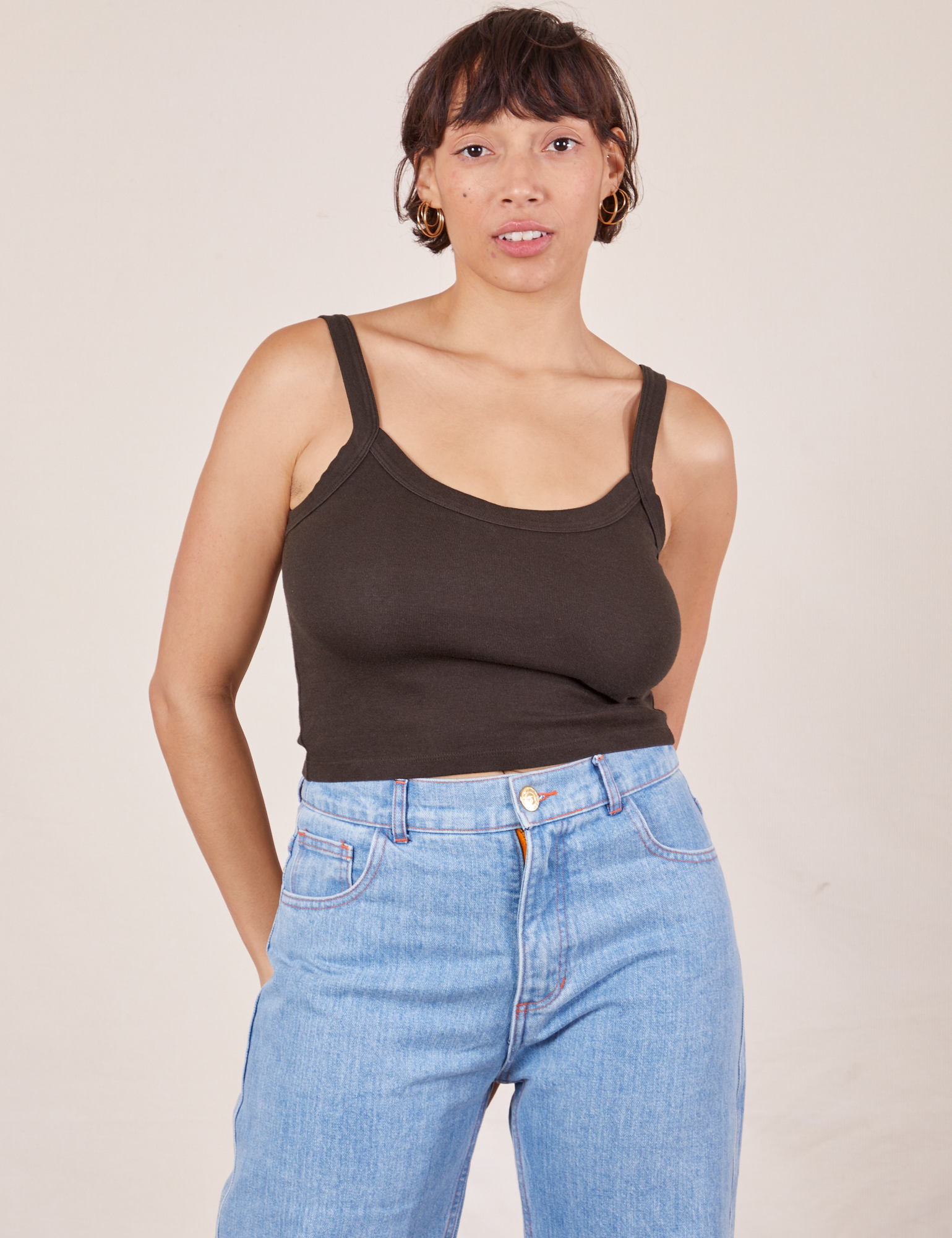 Tiara is 5&#39;4&quot; and wearing XS Cropped Cami in Espresso Brown paired with light wash Sailor Jeans