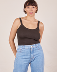 Tiara is 5'4" and wearing XS Cropped Cami in Espresso Brown paired with light wash Sailor Jeans