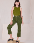 Alex is 5’8” and wearing XXS Railroad Carpenter Jeans in Summer Olive paired with summer olive Muscle Tee