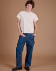 Quinn is 6’3” and wearing M Carpenter Jeans in Dark Wash paired with the Organic Vintage Tee in Vintage Tee Off-White