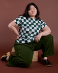 Ashley is wearing Checker Organic Tee in Swamp Green