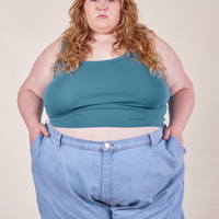 Catie is 5'11" and wearing 4XL Cropped Tank Top in Marine Blue