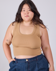Ashley is 5'7" and wearing L Cropped Tank Top in Tan