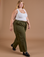 Juliet is wearing Drop Pocket Cargo Pants in Surplus Green paired with a Cropped Tank Vintage Tee White