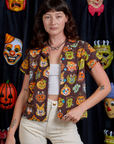 Alex is is 5'8" and wearing P Halloween Masks Pantry Button-Up