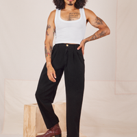Jesse is 5'8" and wearing XXS Heavyweight Trousers in Basic Black paired with vintage off-white Cropped Tank Top.