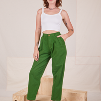 Alex is 5'8" and wearing XXS Heavyweight Trousers in Lawn Green paired with vintage off-white Cropped Cami