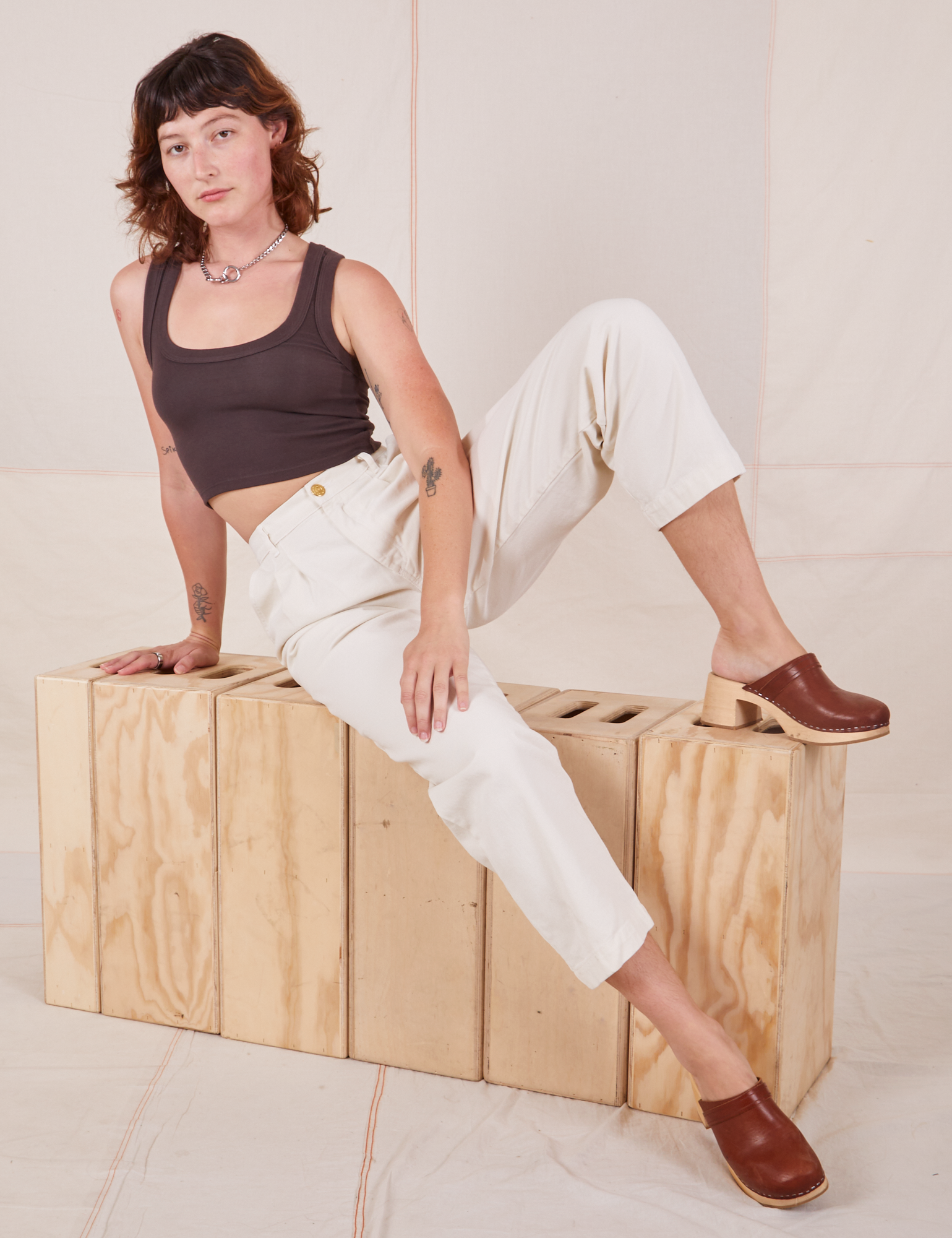 Alex is 5&#39;8&quot; and wearing XXS Heavyweight Trousers in Vintage Tee Off-White paired with espresso brown Cropped Tank Top.