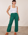 Tiara is 5'5" and wearing S Work Pants in Hunter Green paired with vintage off-white Tank Top