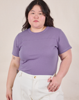 Ashley is 5'7" and wearing L Jr. Varsity Tee in Faded Grape