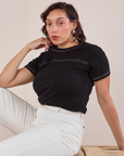 Tiara is wearing JV Tee in Basic Black