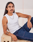 Anthony is wearing Muscle Tee in Vintage Tee Off-White