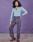 Jesse is 5'8" and wearing XS Marble Splatter Work Pants in Nebula Purple paired with baby blue Long Sleeve Fisherman Polo