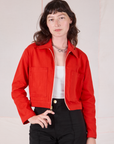 Alex is 5’8” and wearing P Mechanic Jacket in Mustang Red