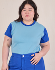 Ashley is 5’7” and wearing L Mismatched Tee in Baby & Royal Blue