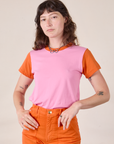 Alex is 5’8” and wearing P Mismatched Tee in Pink & Orange