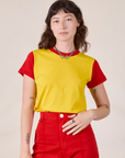 Alex is 5’8” and wearing P Mismatched Tee in Yellow & Red