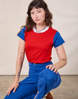 Alex is wearing Mismatched Tee in Red & Blue