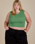 Juliet is 5’7” and wearing M Muscle Tee in Seafoam Green