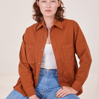 Alex is wearing size P Oversize Overshirt in Burnt Terracotta
