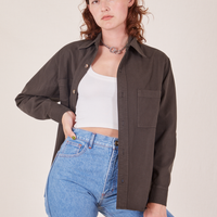 Alex is wearing size P Oversize Overshirt in Espresso Brown paired with a vintage off-white Cropped Tank Top underneath