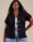 Meghna is 5’8” and wearing M Pantry Button-Up in Basic Black