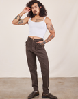 Jesse is 5'8" and wearing XS Pencil Pants in Espresso Brown paired with Cropped Cami in vintage tee off-white