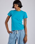 Kira is 5’10” and wearing P Jr. Varsity Tee in Hawaiian Blue