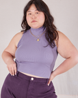 Ashley is 5'7" and wearing L Sleeveless Essential Turtleneck in Faded Grape