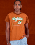 Jerrod is 6'3" and wearing M Vintage Tee in Orange Soda