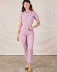 Alex is 5'8" and wearing XXS Short Sleeve Jumpsuit in Lilac