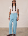 Anthony is 5'10" and wearing S Work Pants in Baby Blue paired with an Organic Vintage Tee in Vintage Tee Off-White