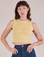Alex is 5'8" and wearing P Muscle Tee in Butter Yellow