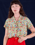 Alex is 5'8" and wearing P Off-White Strawberry Pantry Button-Up