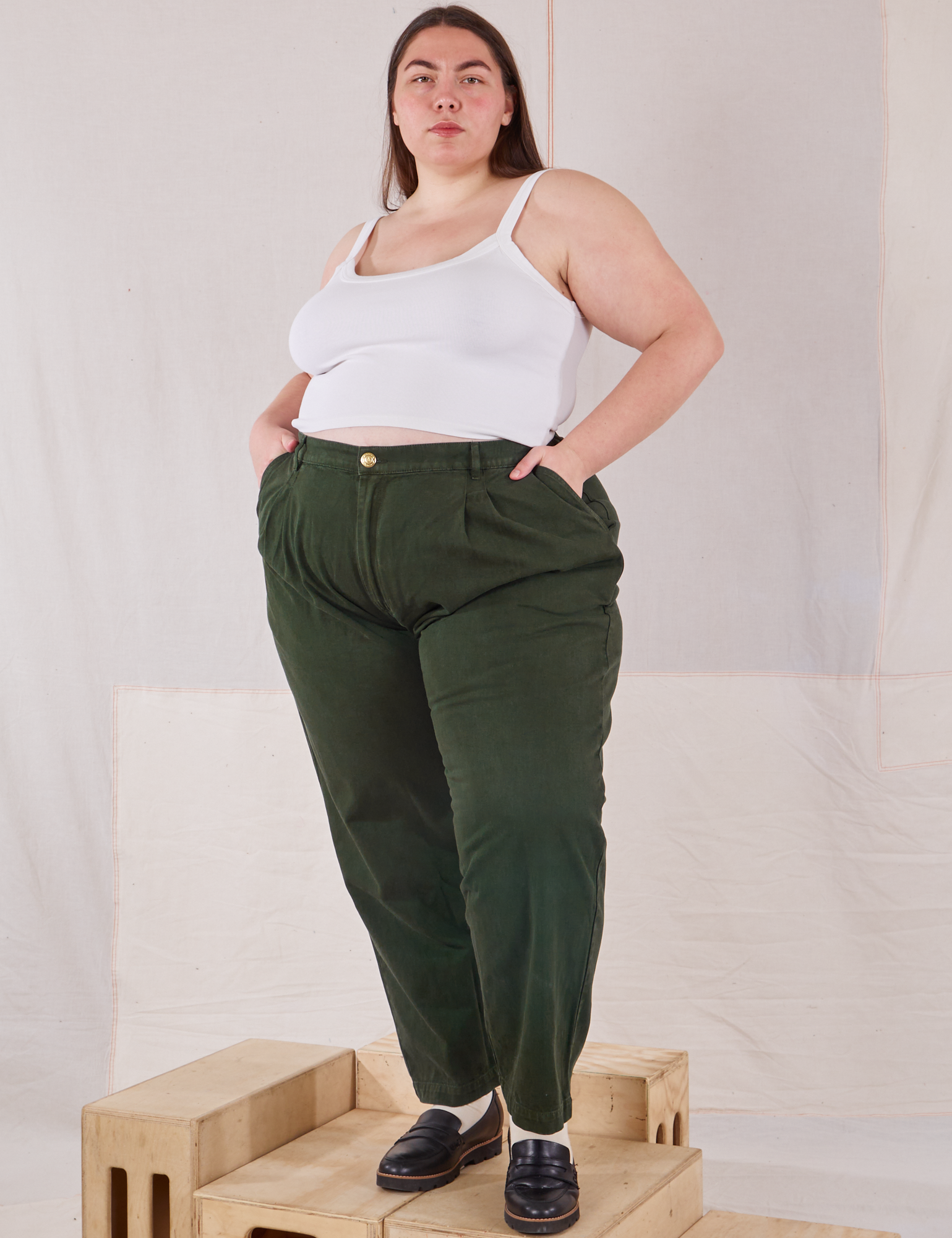 Marielena is 5&#39;8&quot; and wearing 2XL Heavyweight Trousers in Swamp Green paired with vintage tee off-white Cami