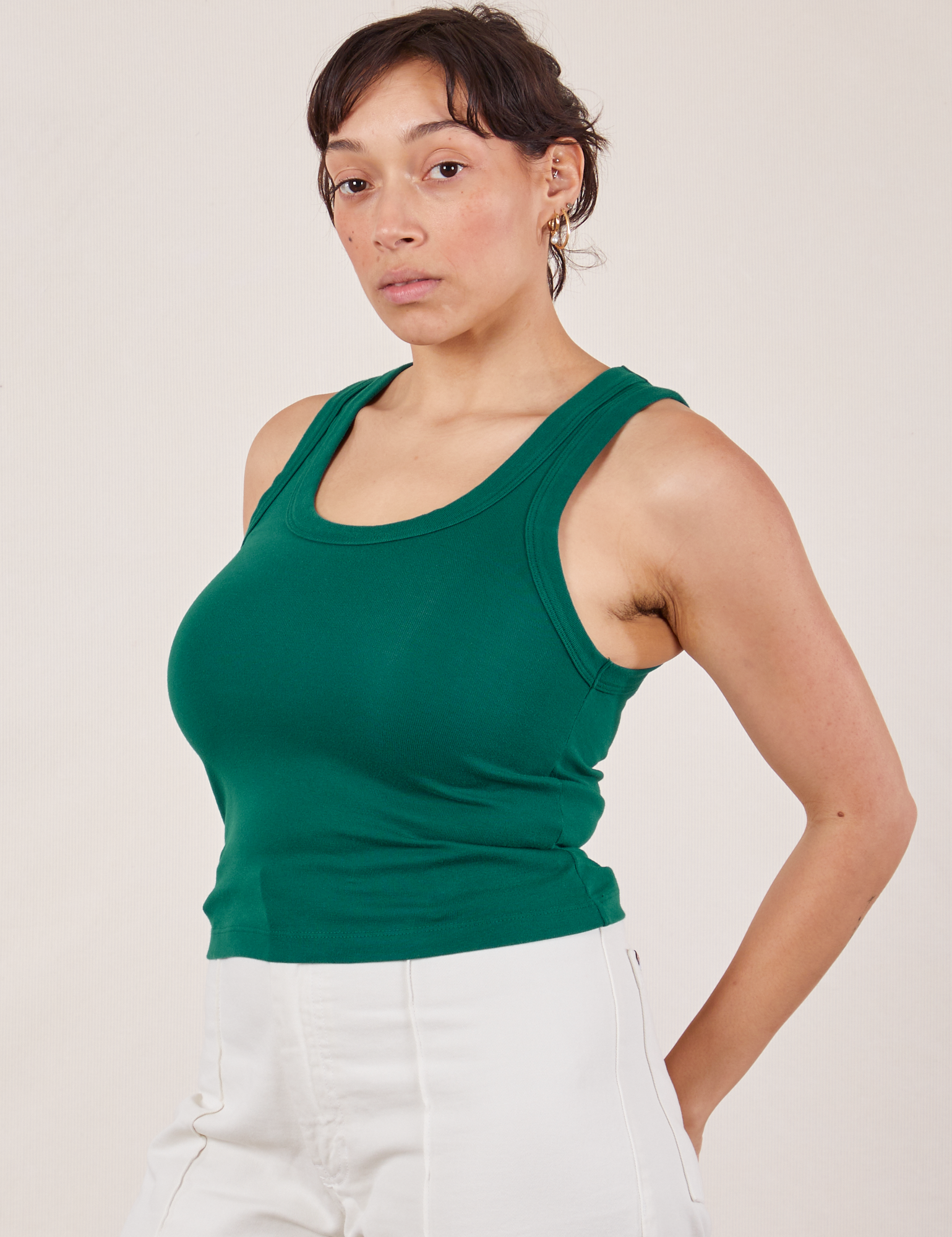 Angled front view of Tank Top in Hunter Green on Tiara