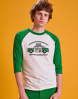 Quinn is 6'3" and wearing M Taxi Raglan Tee in Chicago. White body with green sleeves.