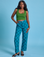 Kandia is 5'3" and wearing XS  Checkerboard Work Pants in Blues paired with lawn green Cropped Tank