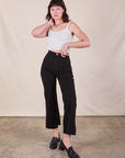 Alex is 5'8" and wearing XS Western Pants in Basic Black paired with a Cami in vintage tee off-white