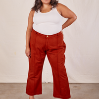 Alicia is 5'9" and wearing 2XL Western Pants in Paprika paired with a vintage off-white Tank Top