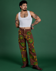 Jesse is 5’7” and wearing S Floral Painted Work Pants in Brown paired with a Cropped Tank in Vintage Tee White