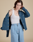 Hana is 5'3" and wearing P Denim Work Jacket in French Blue