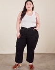 Ashley is 5'7" and wearing Petite 1XL Work Pants in Basic Black paired with Tank Top in vintage tee off-white