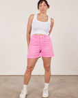 Tiara is 5’4” and wearing S Classic Work Shorts in Bubblegum Pink paired with Cropped Tank Top in vintage tee off-white
