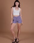 Alex is 5’8” and wearing XXS Classic Work Shorts in Faded Grape paired with a Cropped Tank Top in Vintage Tee White